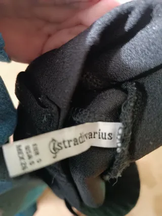 Pantalón negro punto pata ancha con trabillas