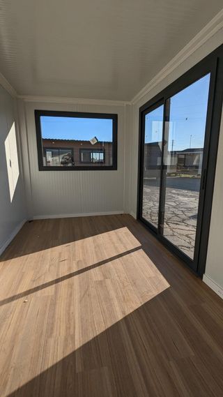 CASETA EN FORRADO DE MADERA