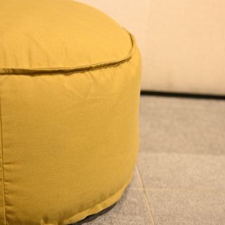 Pouf rotondo Kave Home giallo