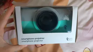Proyector móvil gris y verde