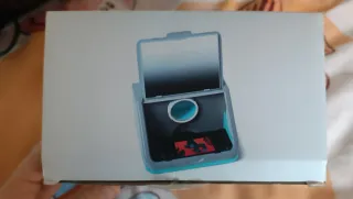 Proyector móvil gris y verde