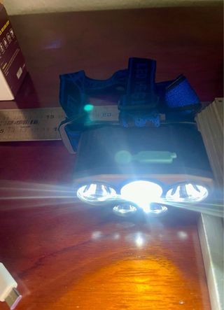 Linterna frontal recargable USB