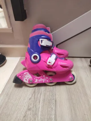 Patines Oxelo rosas talla 26/28