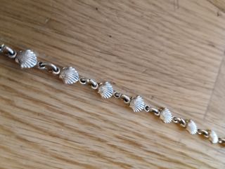 Pulsera conchas plateada años 60