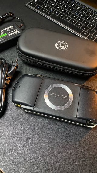 PSP 1004 batería + cargador + estuche + 64gb