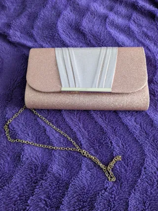 Bolso de fiesta rosa y dorado