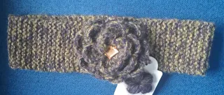 Fascia per capelli lavorata a mano con fiore