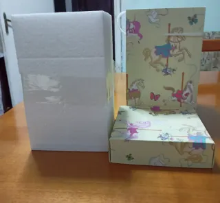 Carillon giostra cavalli rosa e oro