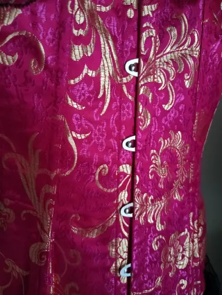 Corsetto burlesque rosa fucsia e oro