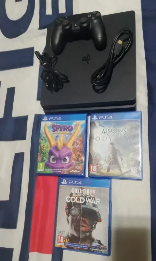 PlayStatio 4 + 3 juegos.