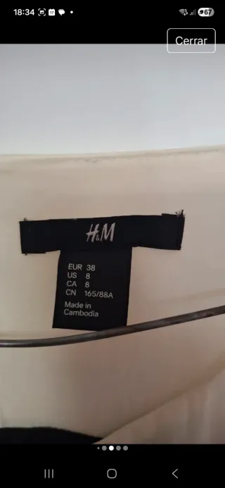 Blusón suelto beige y negro