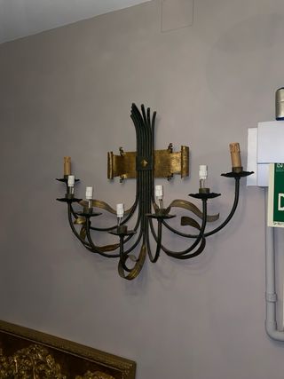 Candelabro antiguo metal negro y dorado