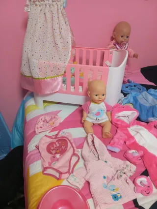 Lote Baby Born cuna y muñeco Simba