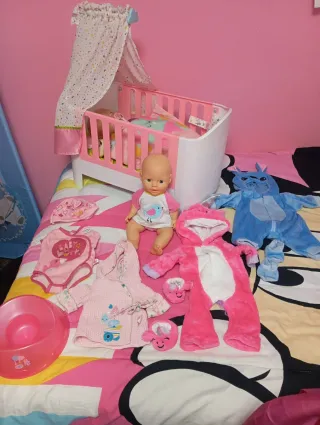 Lote Baby Born cuna y muñeco Simba