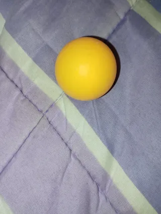 Pelota de ping pong naranja
