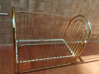 Cuna metálica dorada brillante 123x63