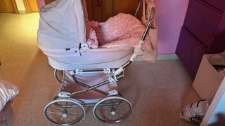 Carrito de bebé rosa