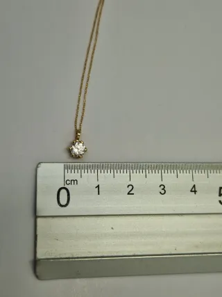 Collar de oro 18kt con circonita.