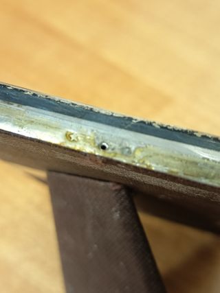 Portafotos antiguo de plata