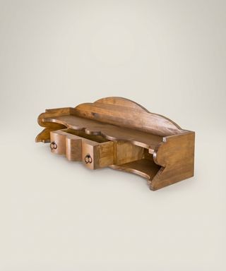 Estantería de pared con cajón