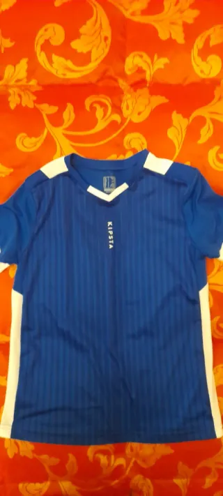 Completo calcio bimbo Kipsta blu 7 anni.
