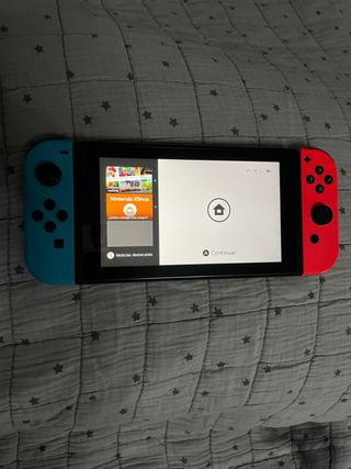 Nintendo Switch Azul/Rojo + Funda Zelda