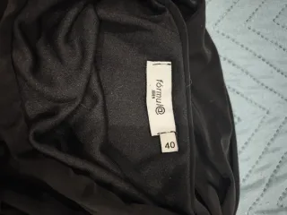 Vestido negro drapeado