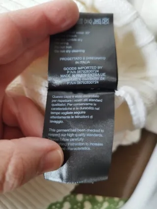 Maglione collo alto Egg family bianco