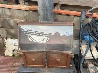 Chimenea de metal y cristal