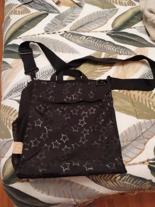 Bolso negro con estrellas para silla de bebé