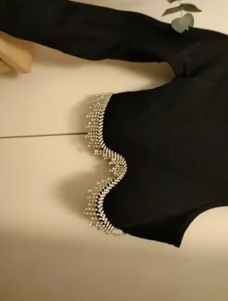 Conjunto negro crop top y pantalón