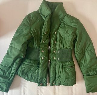 Plumas verde Purificación García.