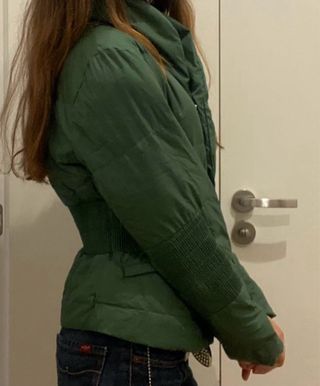 Plumas verde Purificación García.