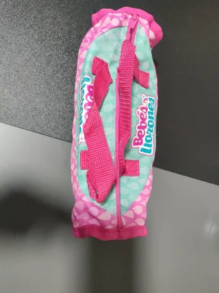 Cuna y mochila de paseo para muñecas Bebés Llorone