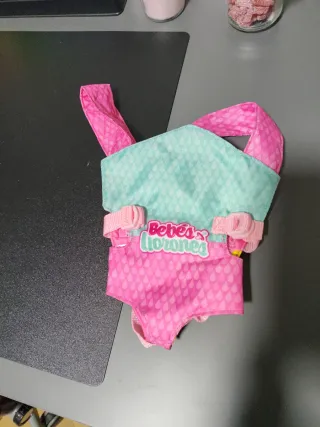 Cuna y mochila de paseo para muñecas Bebés Llorone