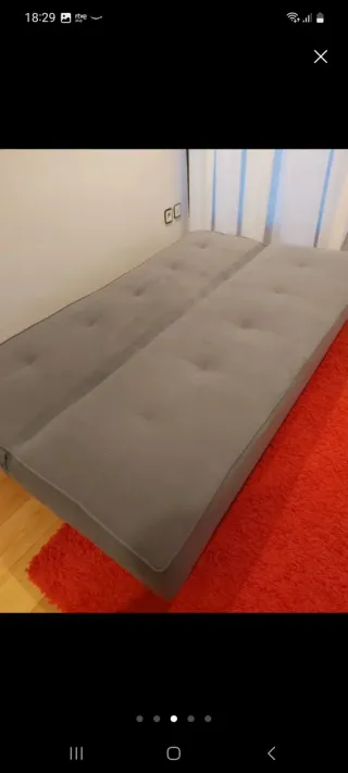 Sofá cama gris moderno
