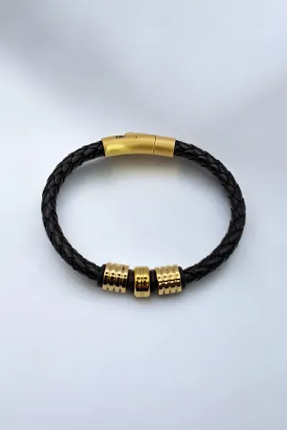 Pulsera trenzada hombre con detalles dorados