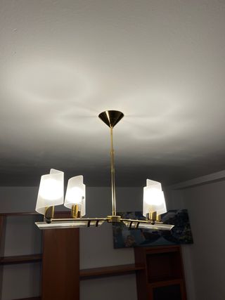 Lámpara colgante dorada y cristal