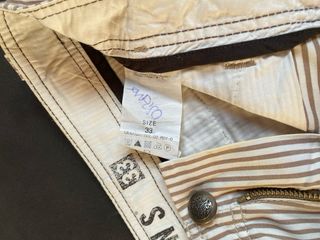 Jeans Guess a righe marrone e bianco