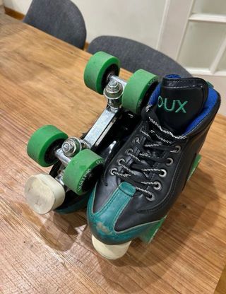 Patines de hockey Sioux negros y verdes