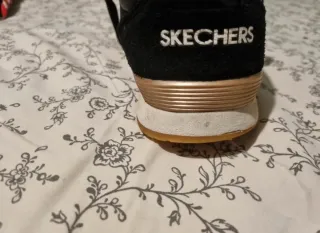 Skechers OG85 Zapatillas Negras Doradas