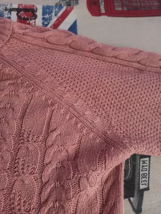 Jersey Stradivarius rosa trenzado