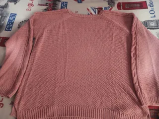 Jersey Stradivarius rosa trenzado