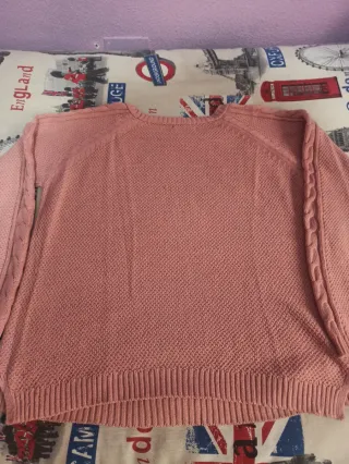 Jersey Stradivarius rosa trenzado