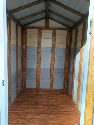 Caseta de jardín de plástico y madera