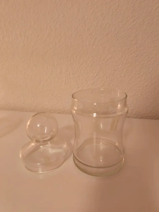 2 Tarros de cristal decorativos.