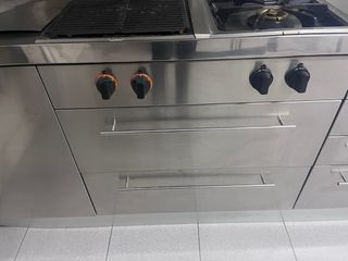 Muebles de cocina acero inoxidable y madera