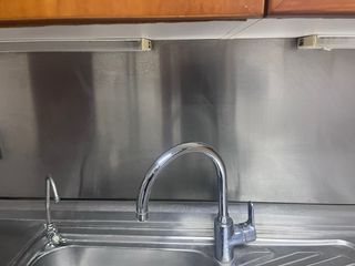 Muebles de cocina acero inoxidable y madera