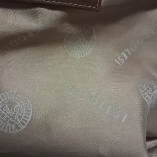 Bolso Pergolesi Dorado y Marrón.