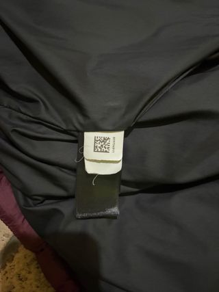 Piumino The North Face nero e bordeaux